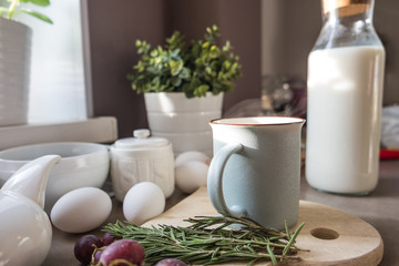 Cup of invigorating morning coffee with healthy breakfast products