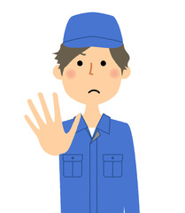 作業服の男性　制止