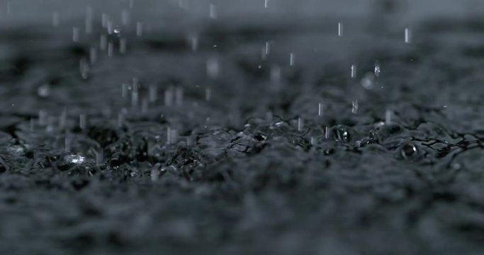 Super slow motion rain drops close up shot on Phantom Flex 4K