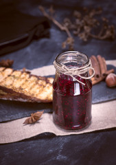glass jar with raspberry jam