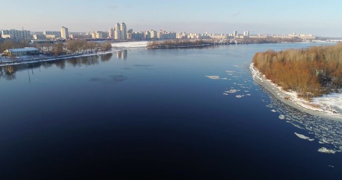 aerial view to the Dneper River along the Obolonskaya embankment in winter