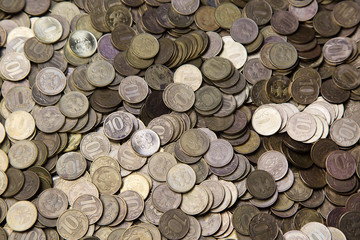 Background of metal coins. Russian iron money ruble scattered on the table
