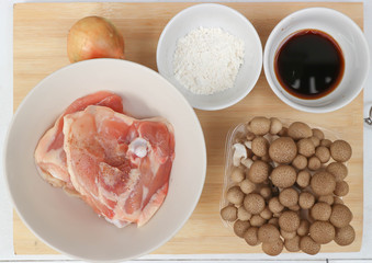 raw chicken and mushroom and sauce