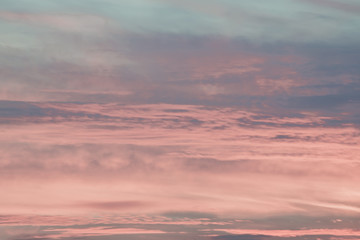 Colorful sunset sky with pink tones