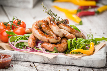 Grilled sausages and vegetables