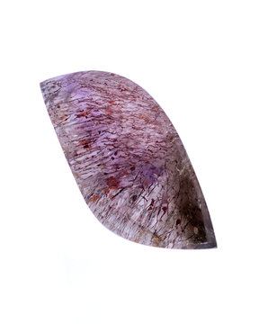 Super Seven Quartz cabochon from Grand Formation in Espirito Santo, Brazil, isolated on white background 