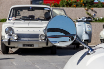 PORTO SANTO STEFANO, ITALY - 23 JUNE 2012: Due Mari Vintage Car And Motorcycle Race, Simca And Vespa Piaggio