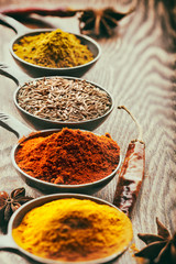 Wooden table of colorful spices