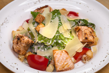 Caesar Salad plate with chicken breast pieces