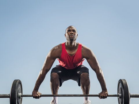 Man preparing for lifting barbell