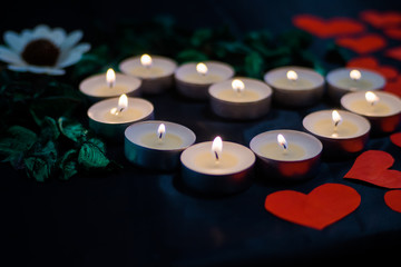 Valentine's Day, romantic design, candles in the form of heart with petals