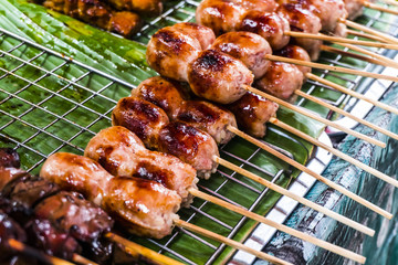 Thai sausages with pork on skewers in Bangkok, Thailand
