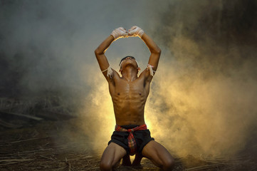 Muay thai, Thai Boxer training in sunset background,Thai boxer culture,Thailand