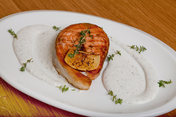 Salmon with cheese sauce