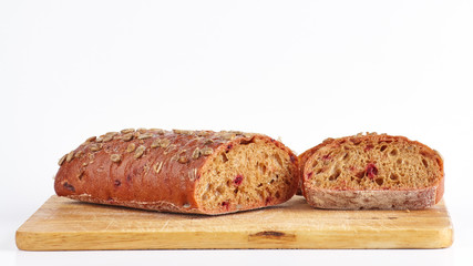 Cut bread with beets and sunflower seeds.