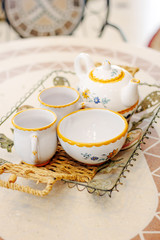 Beautiful ceramic tea set on a table