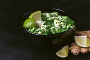 Traditional Indian cuisine. Homemade palak paneer. Copyspace, horizontal view