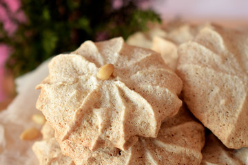 Meringue cookies with pine nuts and almonds