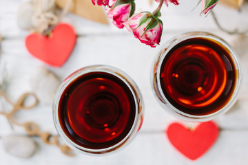 Two wine glasses with heart and letters Love