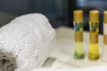 white towel rolled on a sink in spain