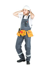 A builder or an employee in a protective helmet is shocked or frightened. Isolated over white...