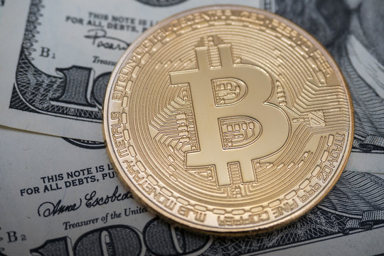 bitcoins lie in dollar bills