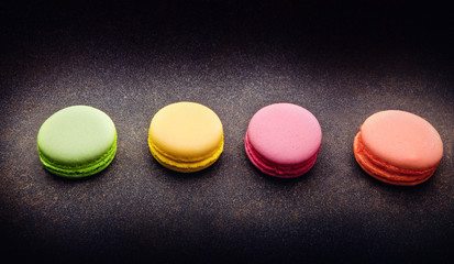 sweet dessert cake macaroon black background 