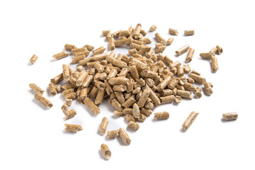 Pile of wood pellets isolated on white background