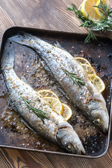 Baked sea bass with lemon and rosemary