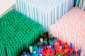 Obraz premium Abstract background from many multi-color straws.