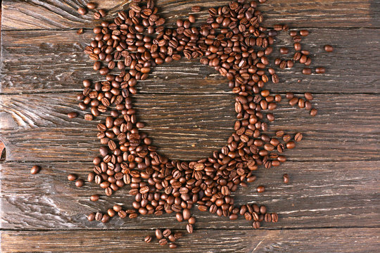 coffee beans sprinkle on the table © Андрей Бутко