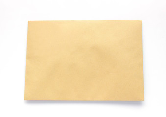 Empty kraft envelope isolated on white.