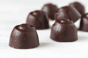 chocolate candies on table, close up view