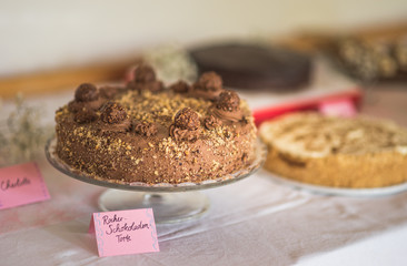 Cakes on buffet on a wedding, sweet desserts baked with nuts, Nusshörnchen to eat after dinner on a birthday