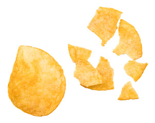 broken potato chips isolated on white background, top view