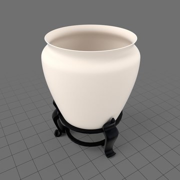 Ceramic vase on a stand