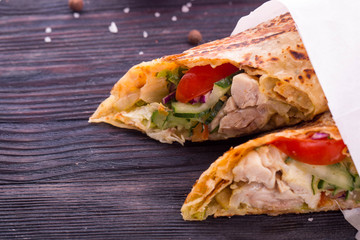 Meat beaters with tomatoes, cucumbers, carrots, greens and seasonings