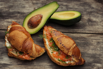 Croissants with salmon and cheese, avacado