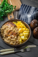 Fried ribs in sauerkraut.