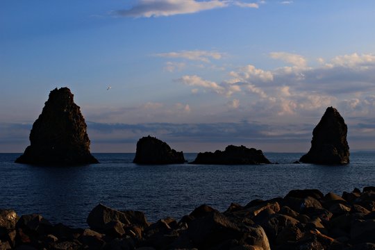 Italy, Sicily: Evening on the Cyclops bay.