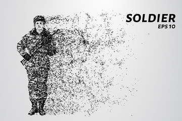 Fototapeta na wymiar The soldier saluted. The soldier consists of particles.