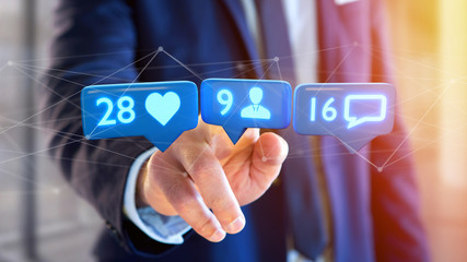 Businessman holding a Like, Follower and message notification on social network - 3d render