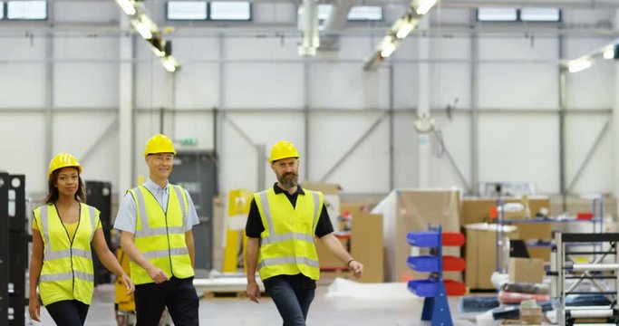 4k, People working inside a printing, packaging and distribution factory