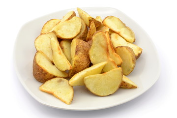 ćwiartki ziemniaków pieczone