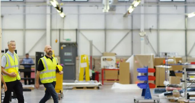 4k, People working inside a printing, packaging and distribution factory