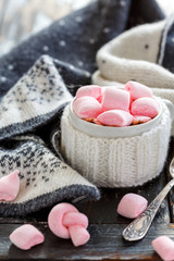 Cup with hot chocolate and marshmallows.