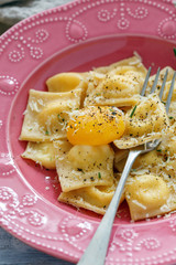 Delicious ravioli with parmesan and egg yolk.