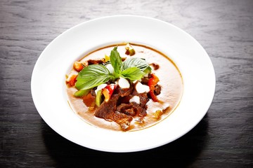 Thai Masaman curry with beef in whilte plate