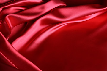 Obraz premium Red silk fabric texture background