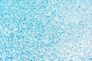 Texture of a pool floor as a blue mosaic